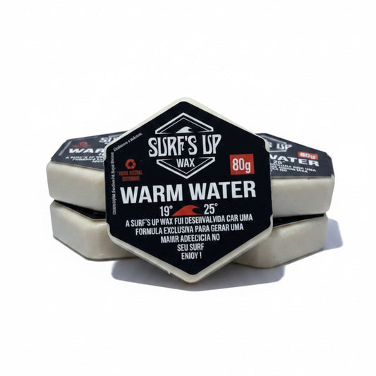 Surf's Up Shop warm water surf wax for 19-25°C water temperatures. Hexagonal bar with black and white packaging.
